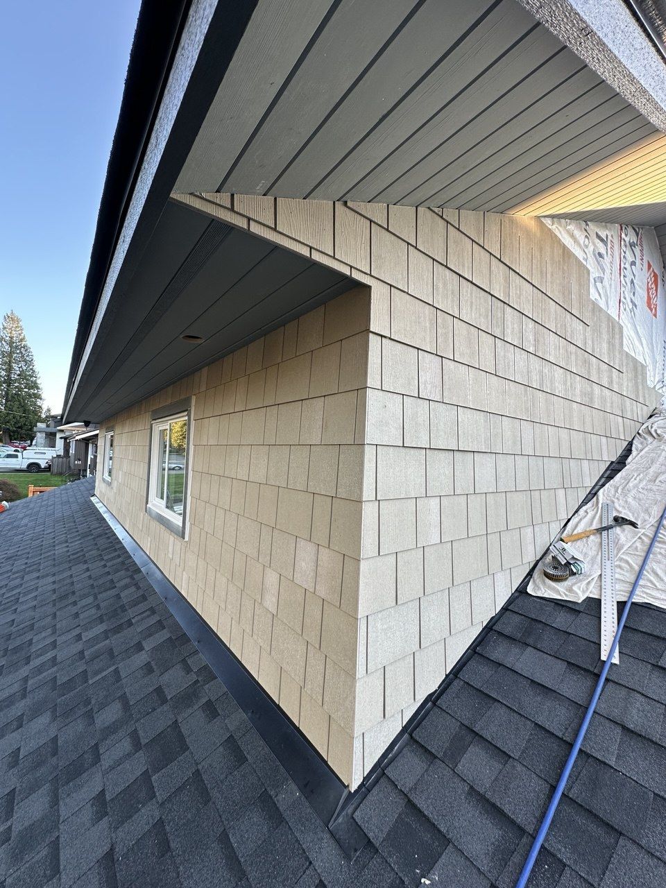 Soffit and fascia at a shingle-clad corner
