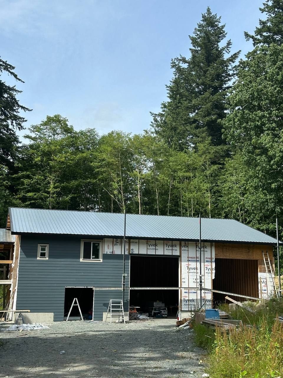 House with a metal roof mid re-side